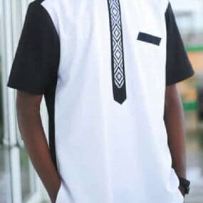 white and black Made in Rwanda shirt